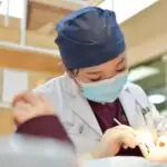 dentist working on an individual