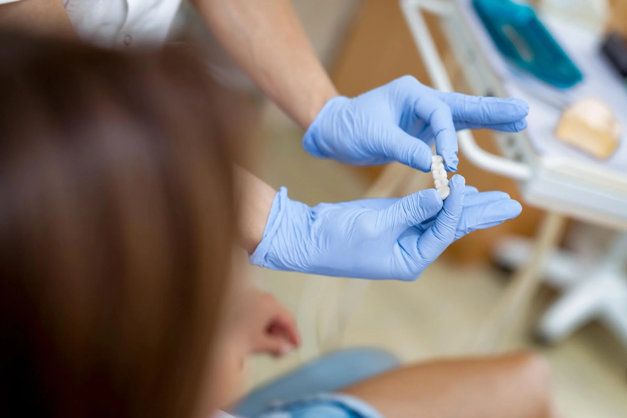 Close-up-of-a-dentist-showing-same-day-crowns-in-Matthews-NC