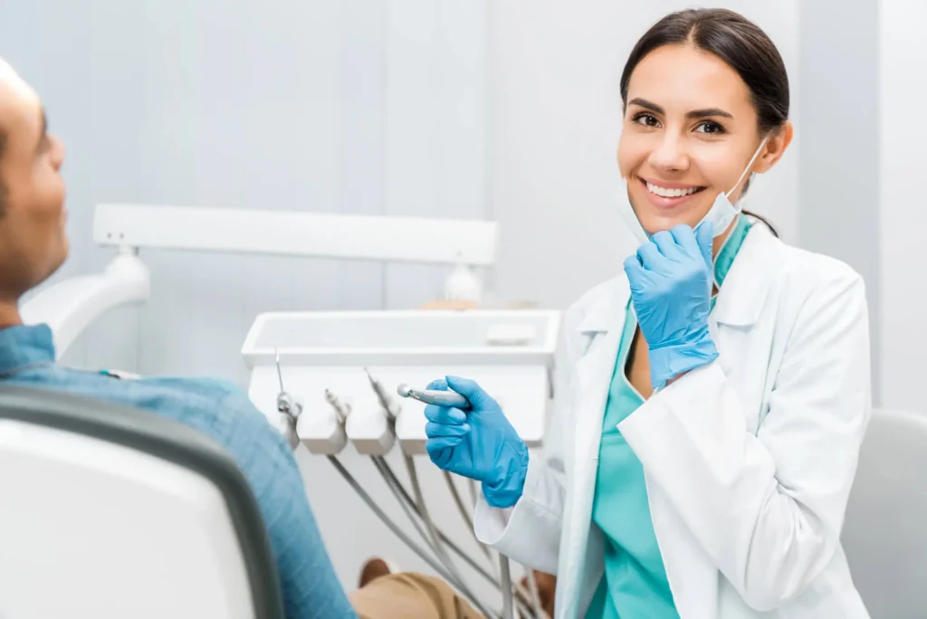 Cheerful-Female-Dentist-Near-Matthews-NC-with-Patient