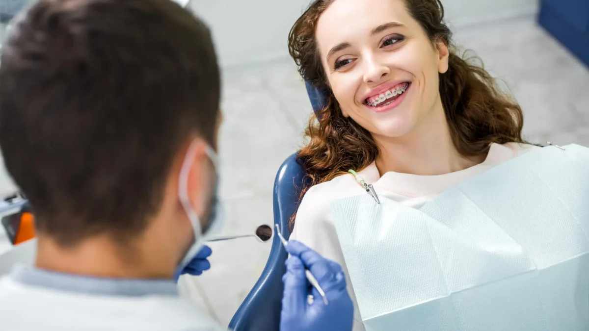 Woman-in-Braces-Visiting-Dentist-Near-Matthews-NC