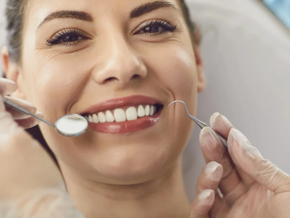 Happy patient after a cosmetic dentist Matthews NC consultation