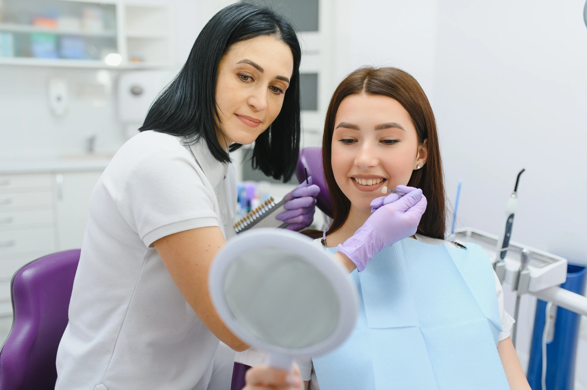 Dentist discussing veneers with the best dentist in Matthews, NC